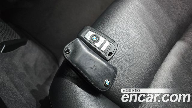 BMW 5-Series 2014 — photo 16
