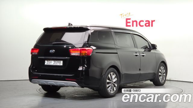 Kia Canival 2015 — photo 2