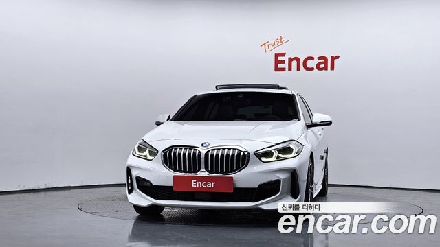 BMW 1-Series 2023 — photo 3
