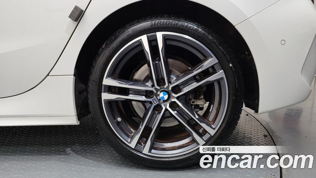BMW 1-Series 2023 — photo 7