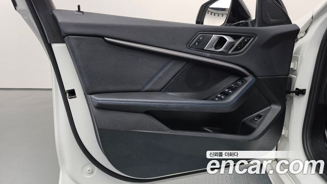 BMW 1-Series 2023 — photo 14