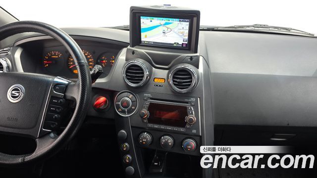 KG Mobility Actyon 2011 — photo 12