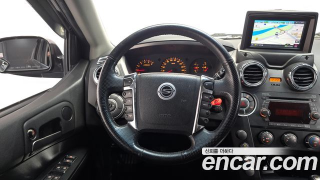 KG Mobility Actyon 2011 — photo 13