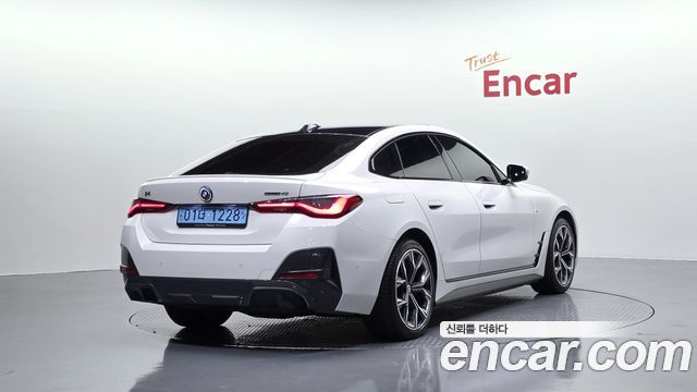 BMW i4 2024 — photo 2