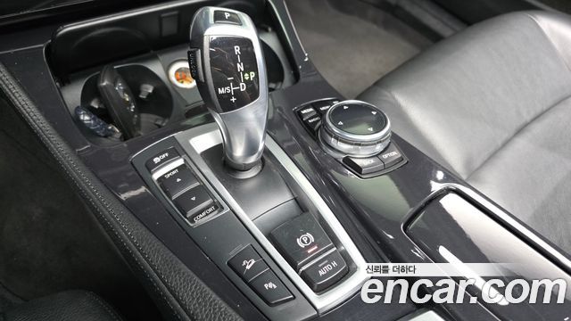 BMW 5-Series 2014 — photo 9