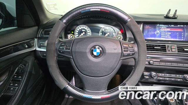 BMW 5-Series 2014 — photo 13