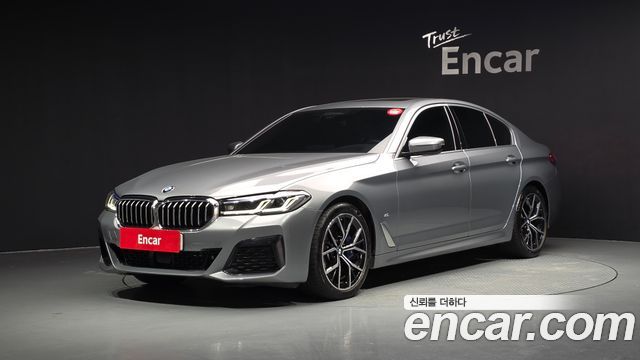 BMW 5-Series 2023 — photo 1