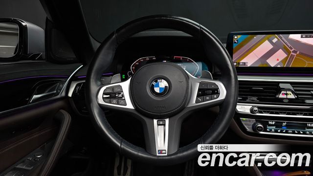 BMW 5-Series 2023 — photo 13