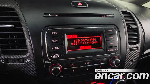 Kia K3 2015 — photo 15