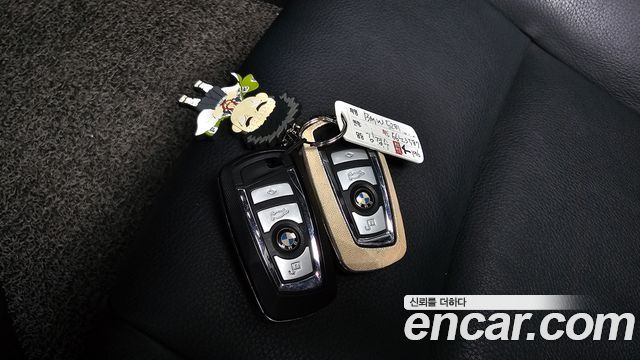 BMW 5-Series 2015 — photo 17