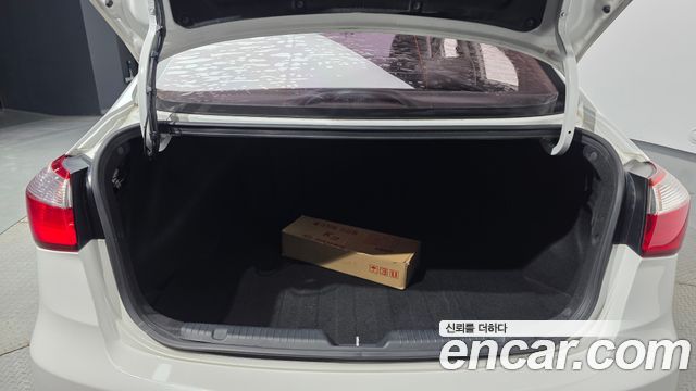 Kia K3 2015 — photo 20