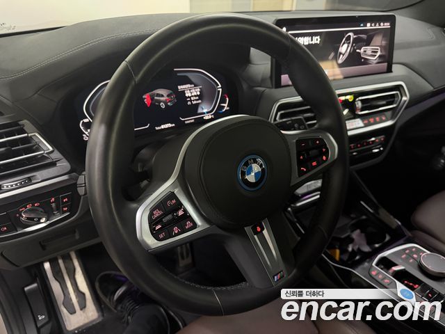 BMW iX3 2023 — photo 12