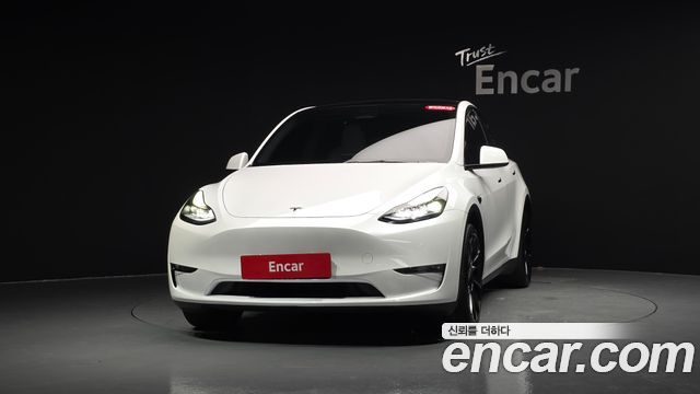 Tesla Model Y 2024 — photo 3