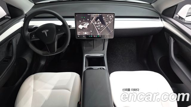 Tesla Model Y 2024 — photo 9