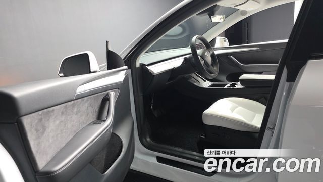 Tesla Model Y 2024 — photo 12