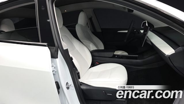 Tesla Model Y 2024 — photo 16