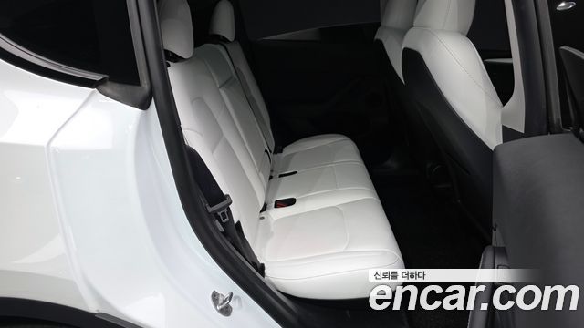 Tesla Model Y 2024 — photo 17