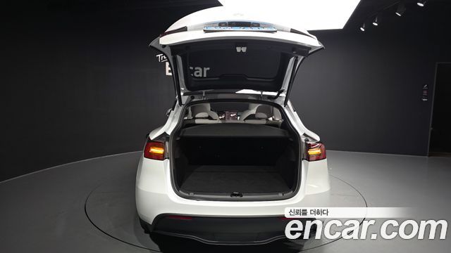Tesla Model Y 2024 — photo 25