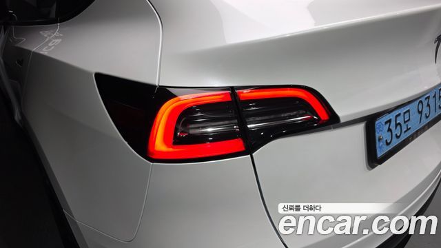 Tesla Model Y 2024 — photo 8