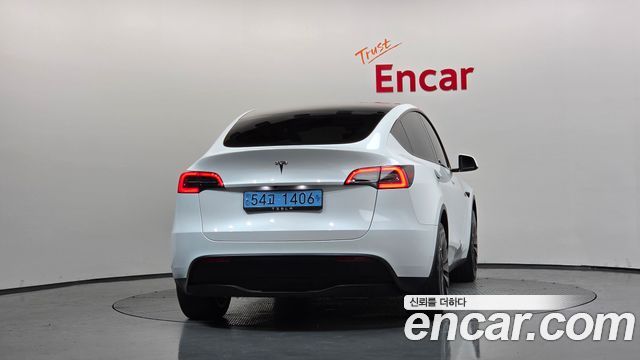 Tesla Model Y 2024 — photo 4