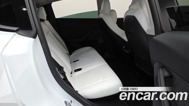 Tesla Model Y 2024 — photo 17