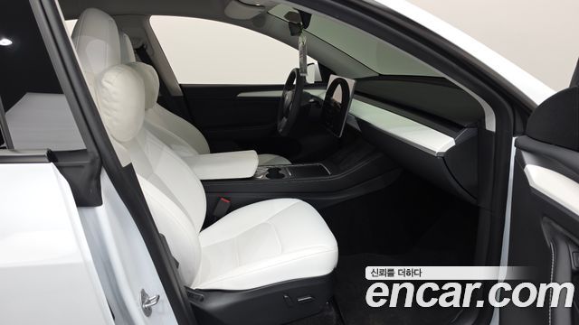 Tesla Model Y 2024 — photo 16