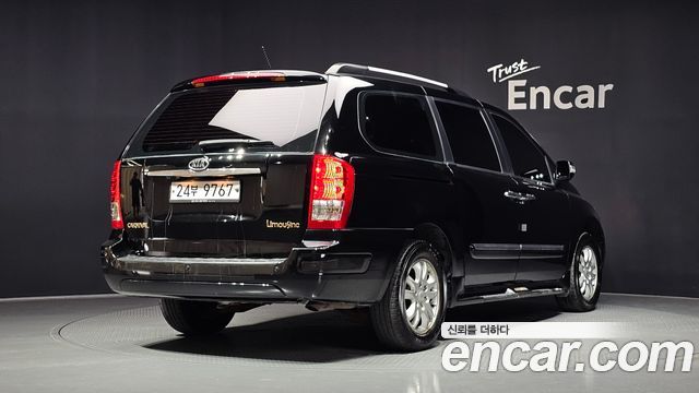 Kia Canival 2012 — photo 2