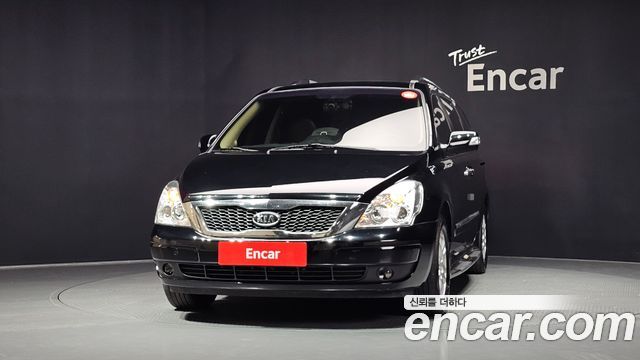 Kia Canival 2012 — photo 3