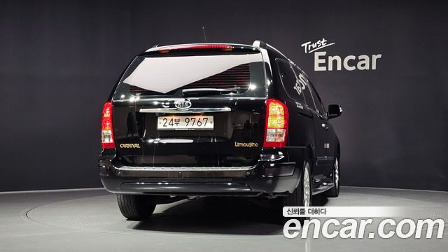 Kia Canival 2012 — photo 4