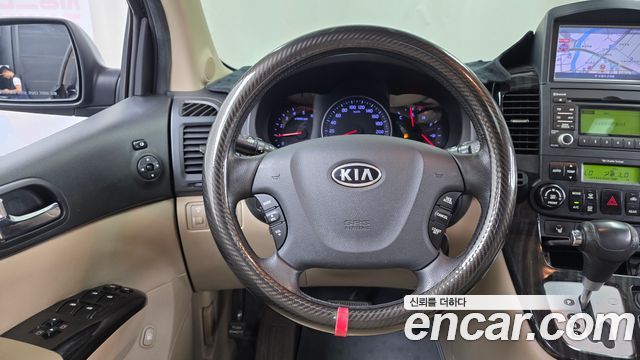 Kia Canival 2012 — photo 18