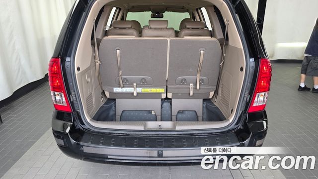 Kia Canival 2012 — photo 26