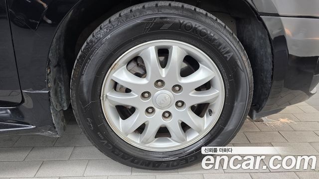 Kia Canival 2012 — photo 7