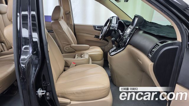 Kia Canival 2012 — photo 16