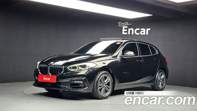 BMW 1-Series 2023 — photo 1