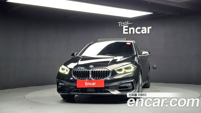 BMW 1-Series 2023 — photo 3