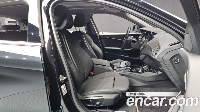 BMW 1-Series 2023 — photo 17