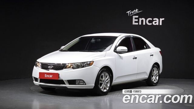 Kia Porte 2012 — photo 1