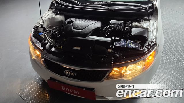 Kia Porte 2012 — photo 6