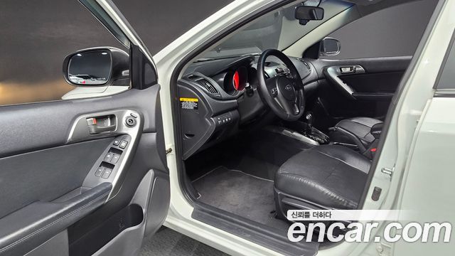 Kia Porte 2012 — photo 13