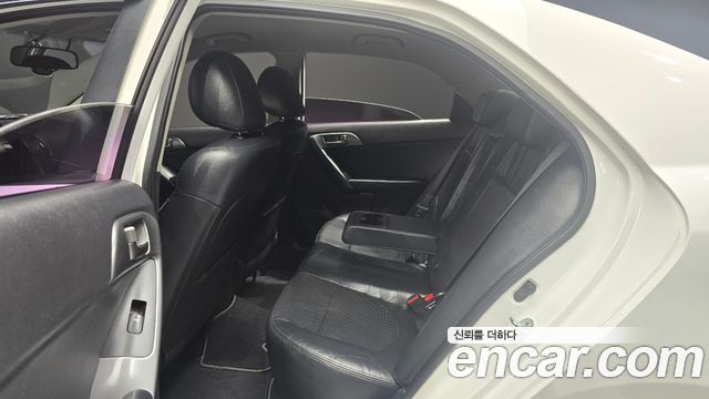 Kia Porte 2012 — photo 17
