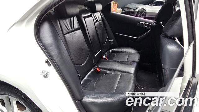 Kia Porte 2012 — photo 18
