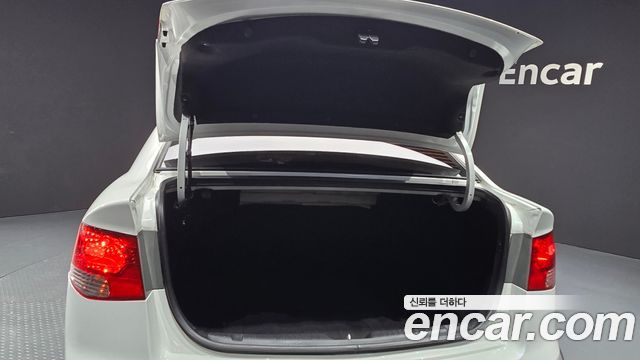 Kia Porte 2012 — photo 24