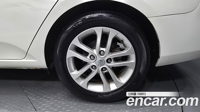 Kia Porte 2012 — photo 7