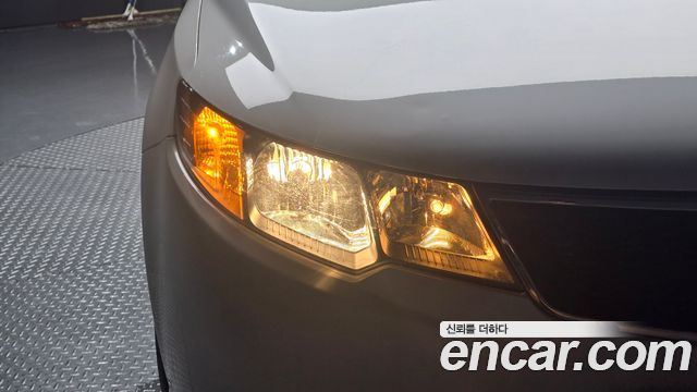 Kia Porte 2012 — photo 8