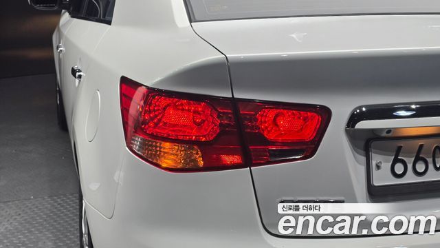 Kia Porte 2012 — photo 9