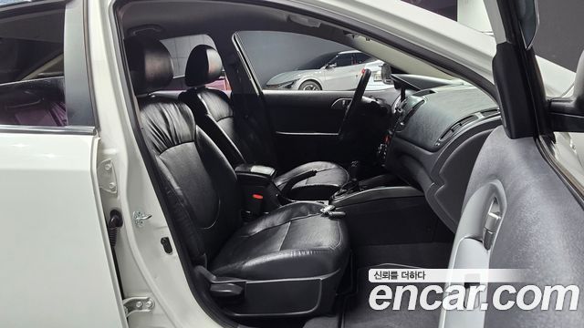 Kia Porte 2012 — photo 16