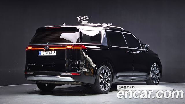 Kia Canival 2021 — photo 2