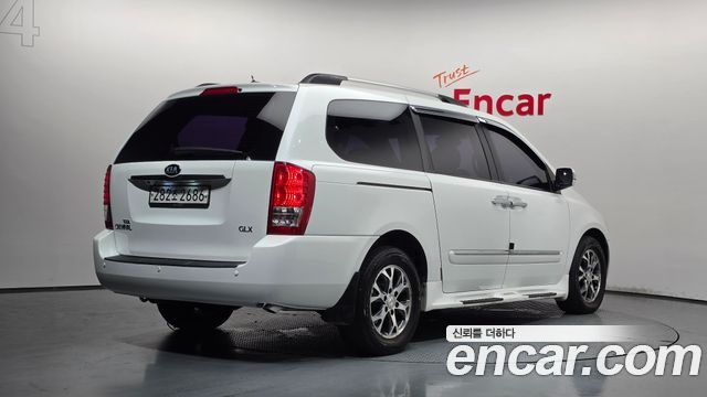 Kia Canival 2013 — photo 2