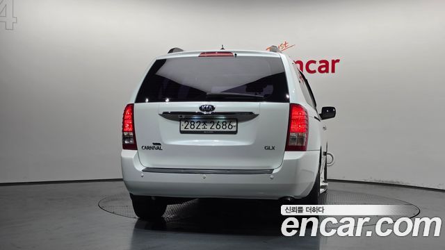 Kia Canival 2013 — photo 4