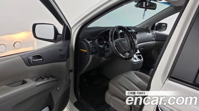 Kia Canival 2013 — photo 10